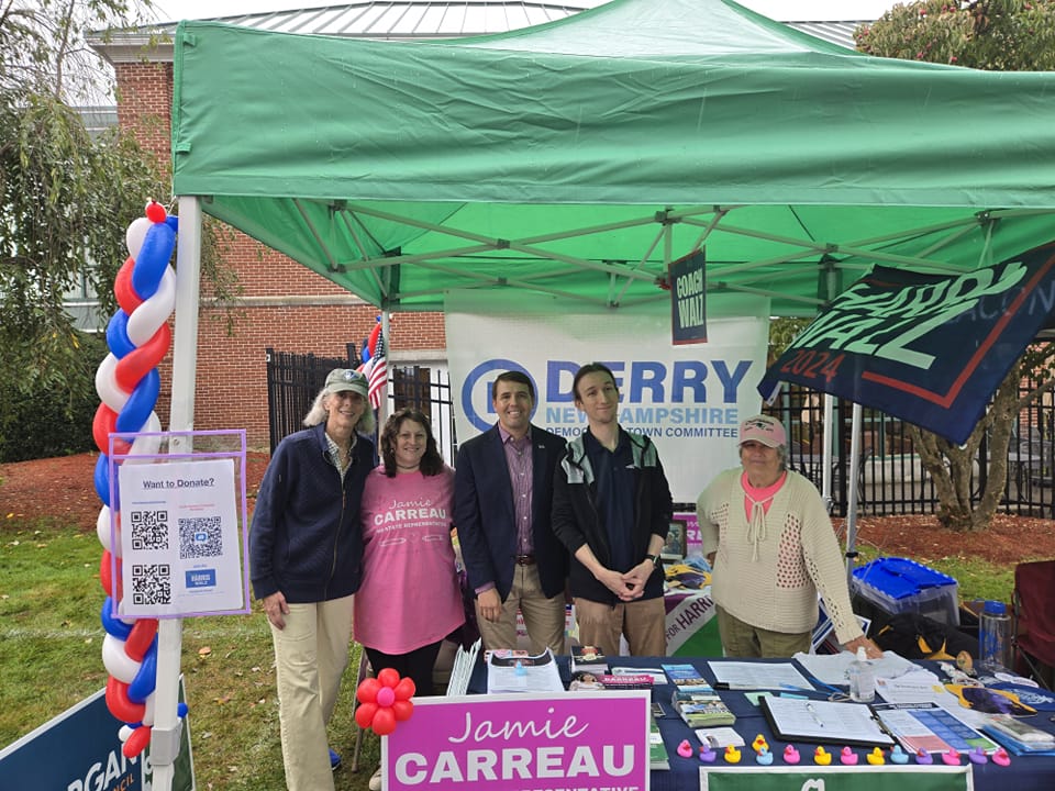 Photo of State Rep candidates Elizabeth Greenberg, Craig Cunningham and Michelle Sawyer Moge' at the Derry Dems booth at DerryFest, Sept. 2022